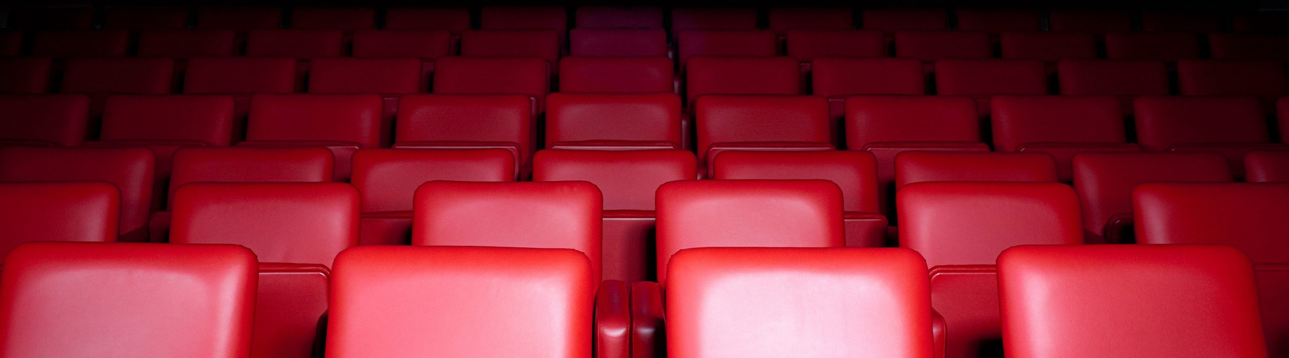 red seats in an empty theater