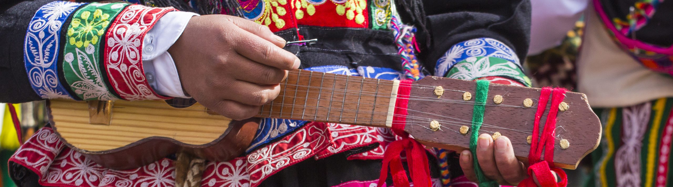 Peruvian musician playing in a parade